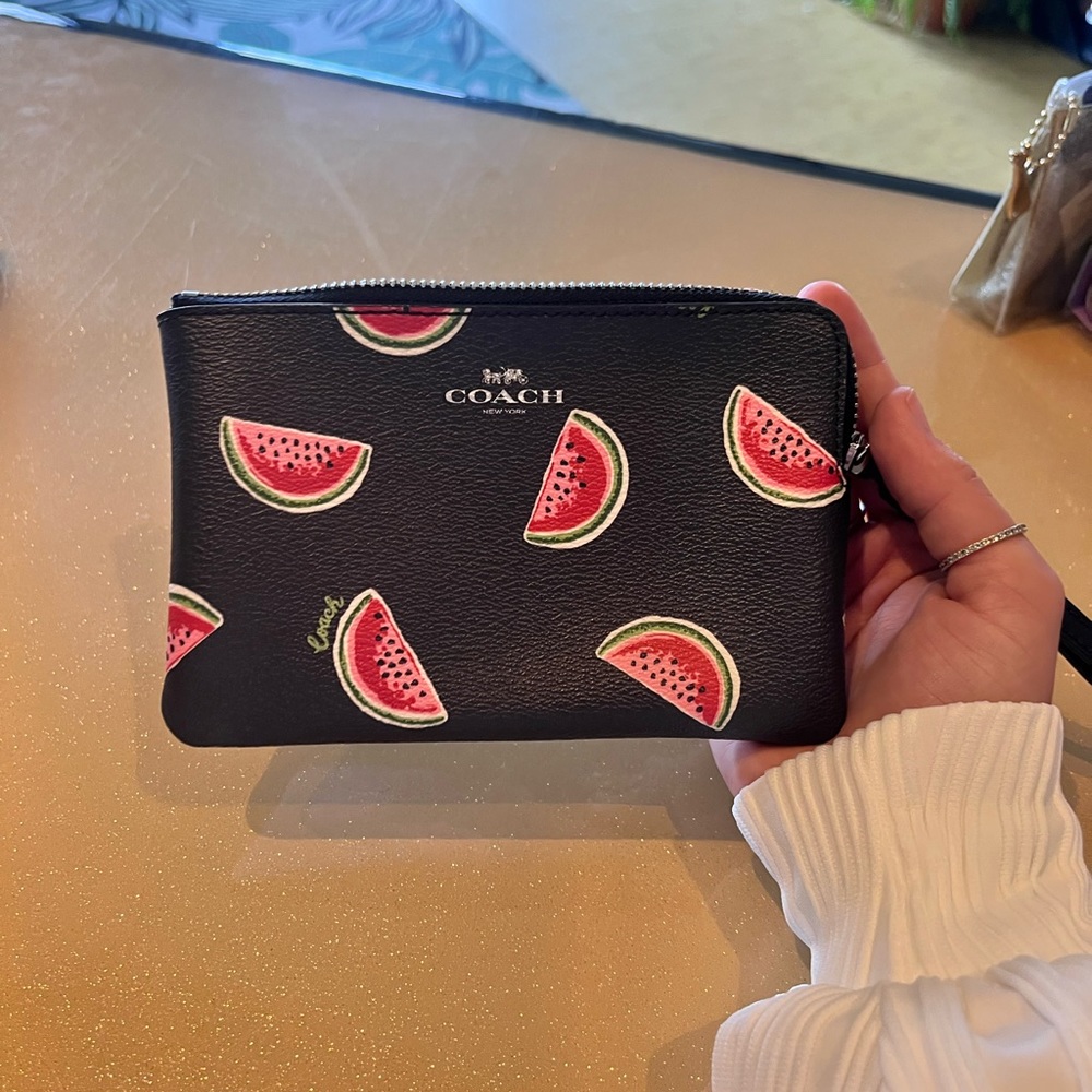 COACH watermelon print corner zip wristlet
